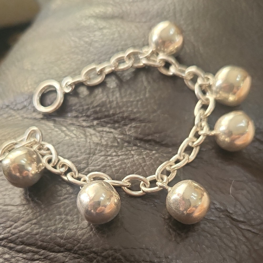 Elegant Silver Charm Bracelet